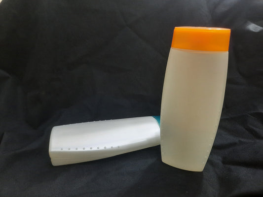 Orange White Shampoo Bottle