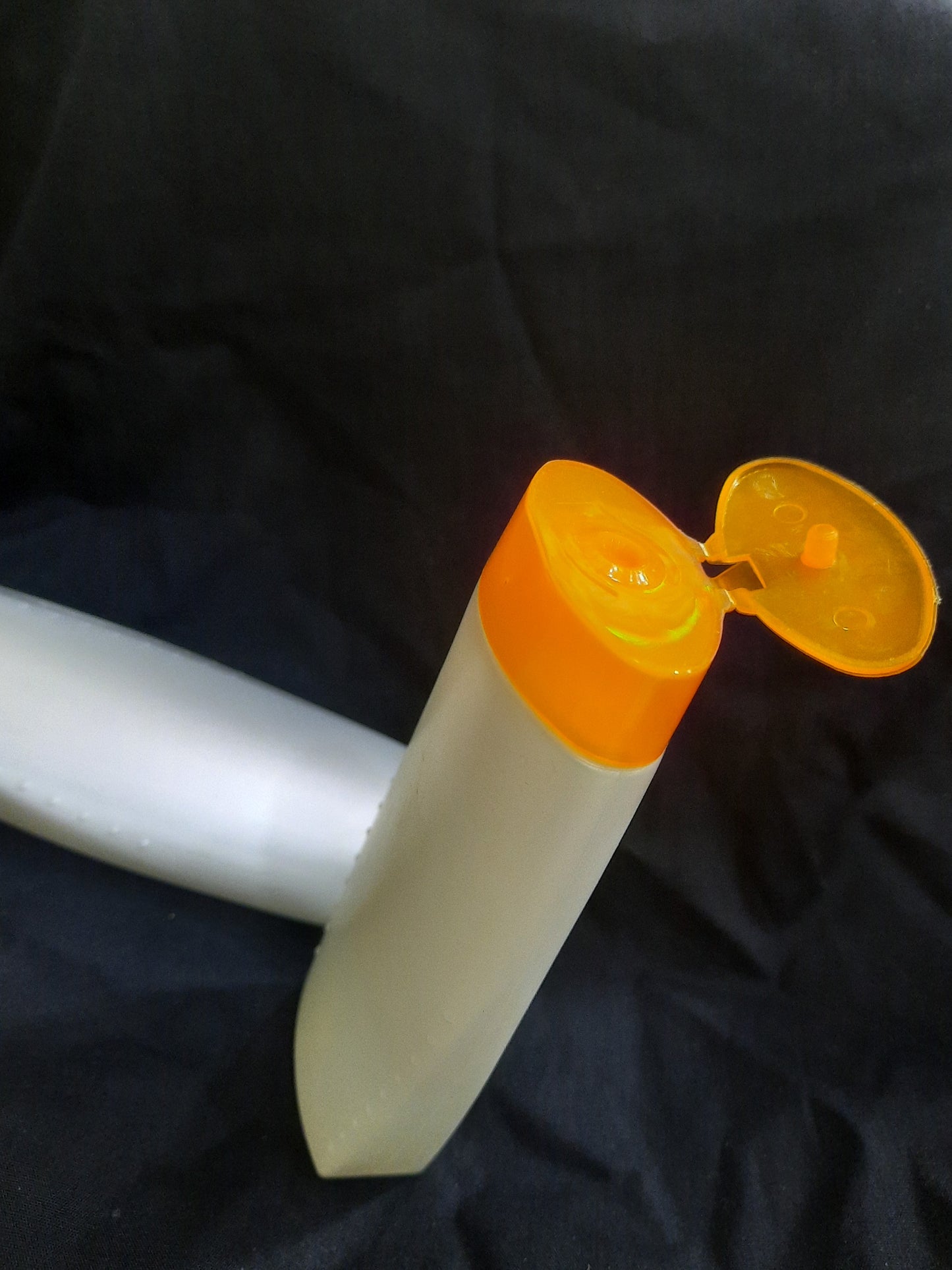 Orange White Shampoo Bottle