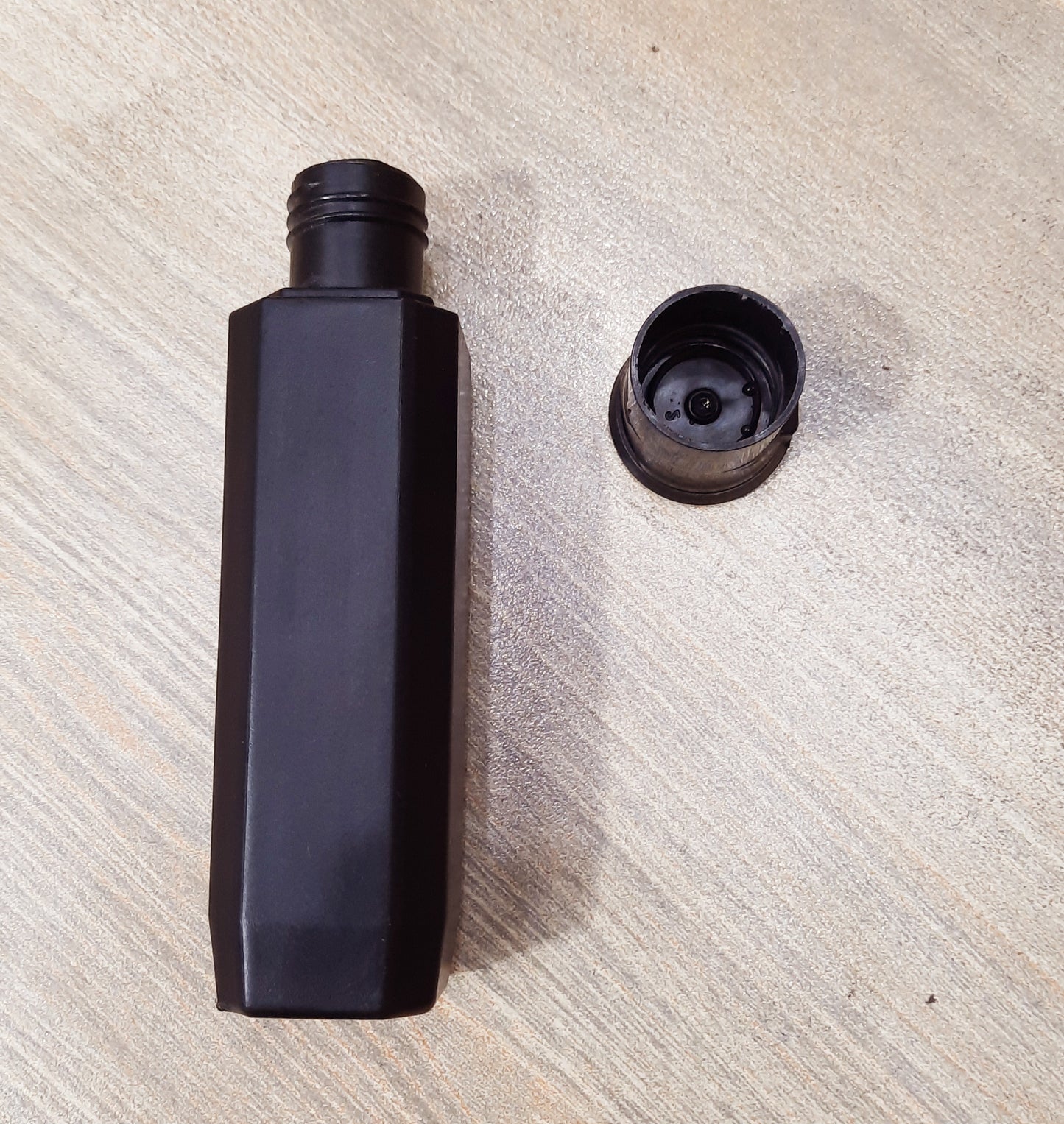 Black Black Shampoo Bottle