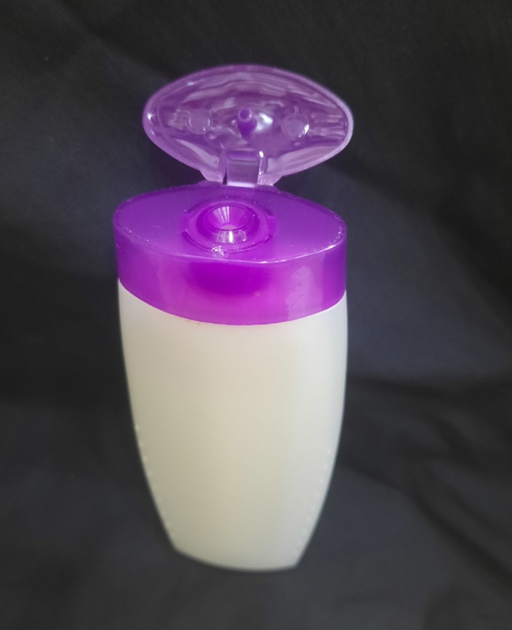 White Purple Shampoo Bottle