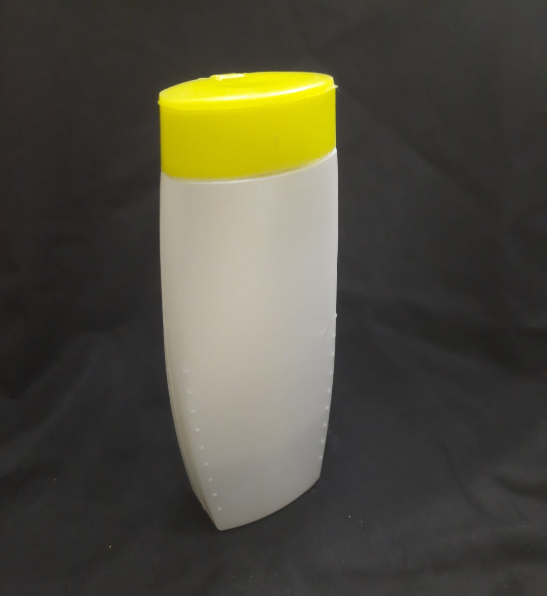 Yellow White Shampoo Bottle